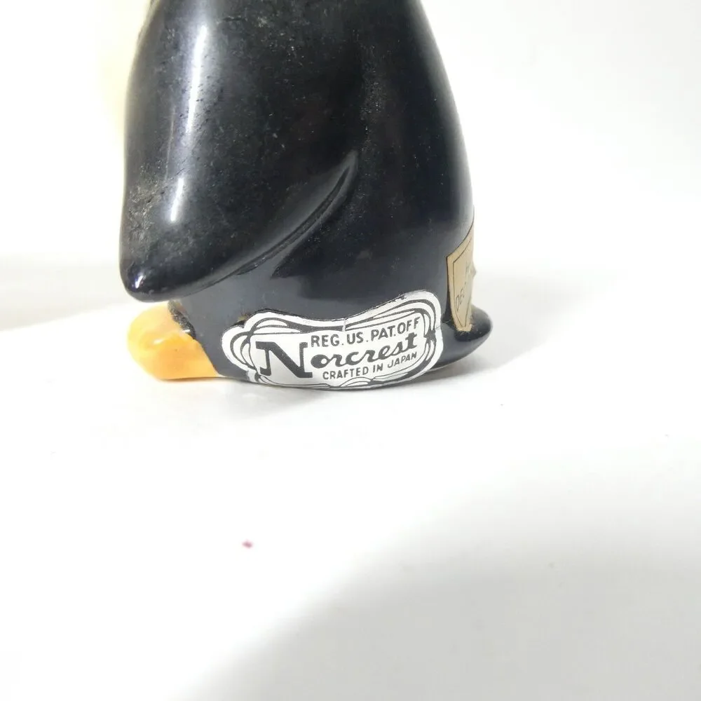 2 Norcrest Japan Salt Pepper Shakers Pink Skunk Squirrel + Penguin Vintage MCM